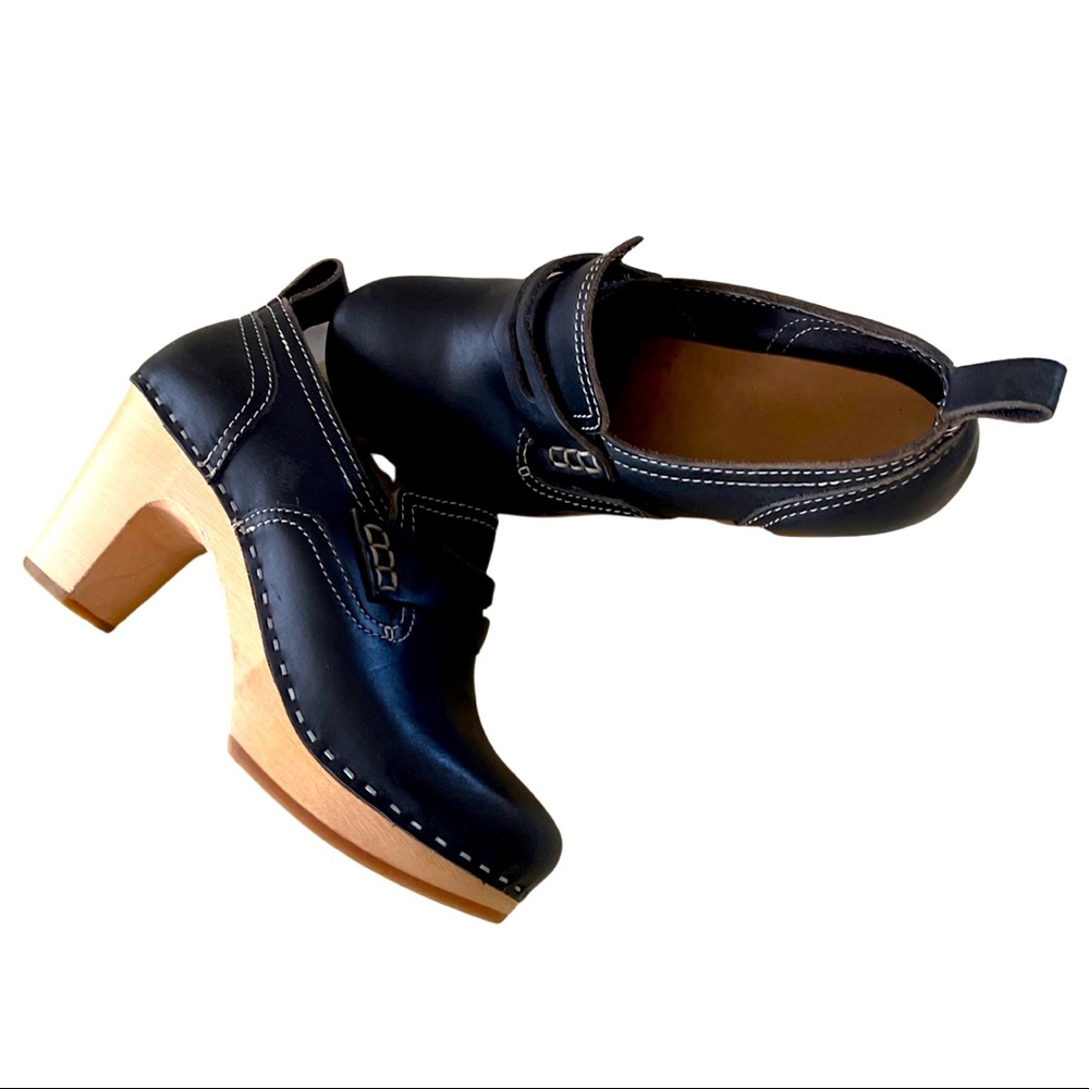 Black high clogs with penny loafer detail